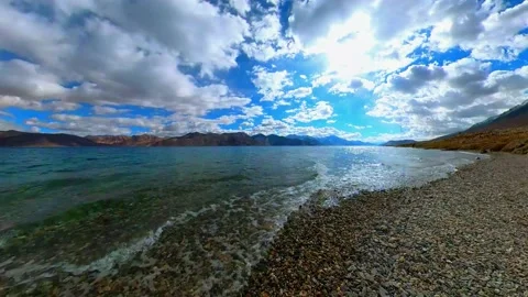 Timelapse of Clouds Over a Blue Lake - Pangong Lake Video stock 237985394
