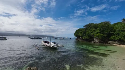Timelapse Clouds Over Boracay Beach Philippines With Traditional Boats On Stock Footage 333672957