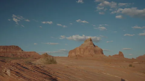 Timelapse of clouds over Boundary Butte near Lake Powell, UT in the late Stock Footage 322134650