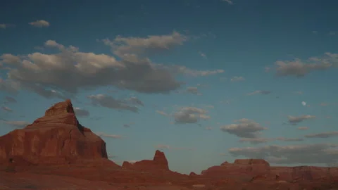 Timelapse of clouds over Boundary Butte near Lake Powell, UT in the early Stock Footage 322134775