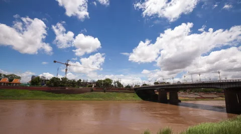 Timelapse clouds over bridge across Nan river in Phitsanulok Stock Footage 54682288