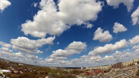 Timelapse clouds over the city Stock Footage 129852833