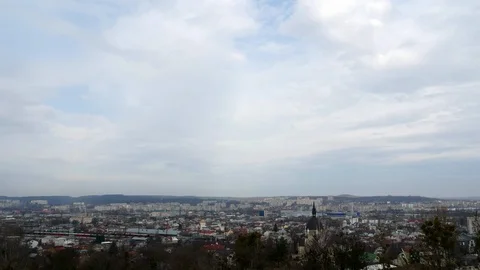 Timelapse of clouds over city rooftops 4k Stock Footage 87203169