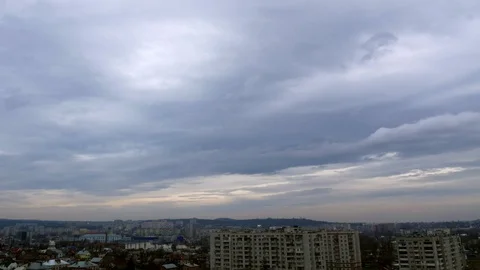 Timelapse of clouds over city rooftops 4k Stock-Footage 87205332
