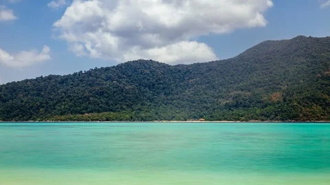 Timelapse of clouds over crystal clear turquoise water in the tropics, Koh Lipe, Stock Footage 100575492