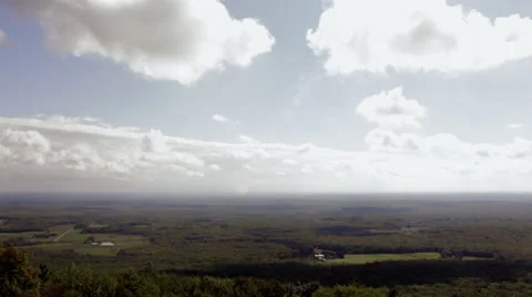 Timelapse: Clouds over expansive farmland Stock Footage 31650104