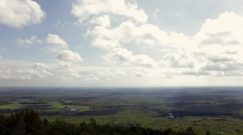 Timelapse: Clouds over expansive farmland Stock Footage 31654212