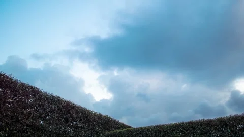 TimeLapse of clouds over a fence 4K 60fps Stock Footage 263512398