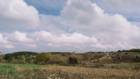 Timelapse clouds over the field. Stock Footage 73494208