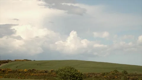 Timelapse clouds over field Stock Footage 336400955
