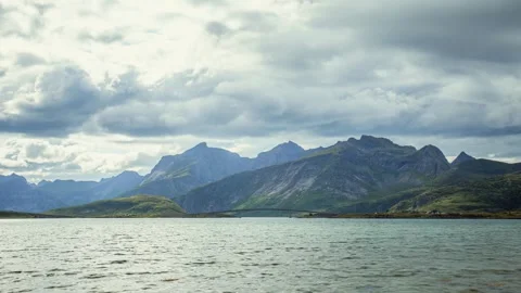 Timelapse of Clouds Over Fredvang Bridge with Boat Passing Below, Norway Stock Footage 318964116