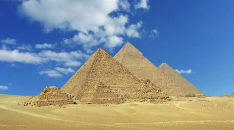 Timelapse with clouds over great pyramids in Egypt Stock Footage