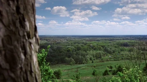 Timelapse clouds over the green field. 스톡 동영상 75419960