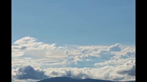 Timelapse of clouds over the hill during the day 스톡 동영상 273692289