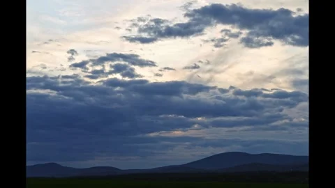 Timelapse of clouds over the hills 스톡 동영상 274438502