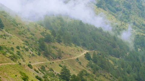 Timelapse, clouds over the hillside, mountain road (Elbrus area) 動画素材 150858809