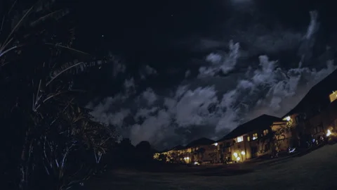 Timelapse clouds over houses Stock Footage 264748633