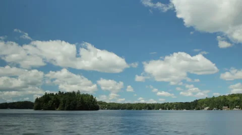 Timelapse clouds over lake. Stock Footage
