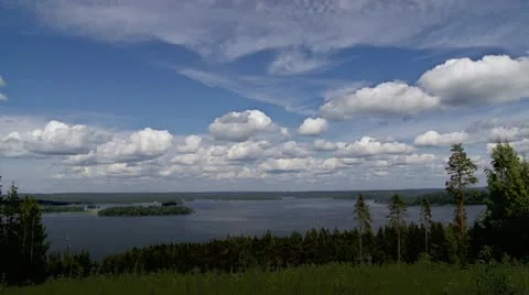 Timelapse of clouds over an lake Stock Footage 10790087