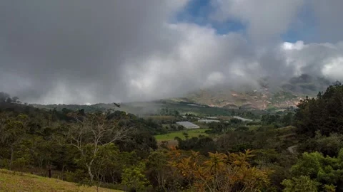 TimeLapse of clouds over a mountain 4K 30fps Stock Footage 263512402