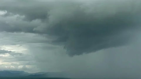 Timelapse of clouds over a mountain with dramatic sky Stock Footage 277936062