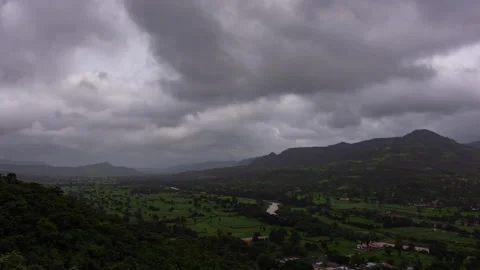 Timelapse - Clouds over a mountain during rainy season 4K60 Stock Footage 271237185