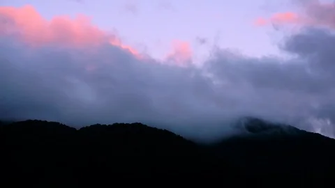 Timelapse Clouds over Mountain Stock Footage 77905936