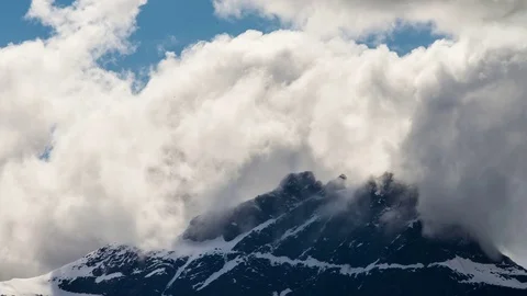 Timelapse of clouds over mountain peak Stock Footage 75012645