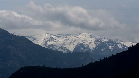 Timelapse clouds over mountain range Stock Footage 74097060