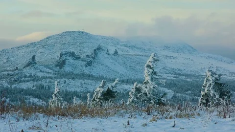 Timelapse clouds over the mountains against the blue sky at sunset Video stock 83010488