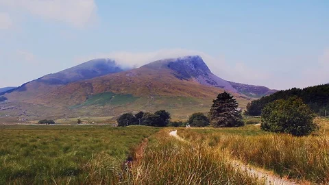 Timelapse clouds over Mynydd Drws Y coed and Y Garn from Rhyd Ddu. Stock Footage 114961425