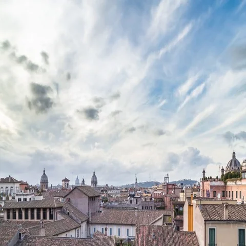 Timelapse of clouds over the old roman roofs and Vatican 스톡 동영상 69544220