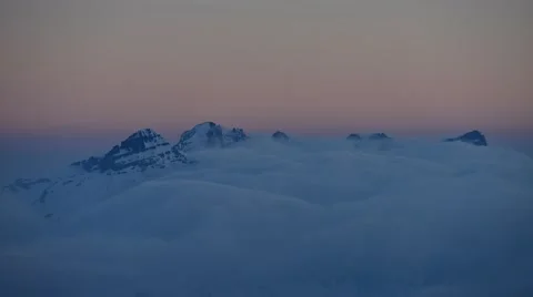 Timelapse with clouds over the peaks of the Alps Stock Footage 61819681