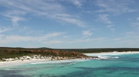 Timelapse of clouds over pristine beach bay Video stock 60047543
