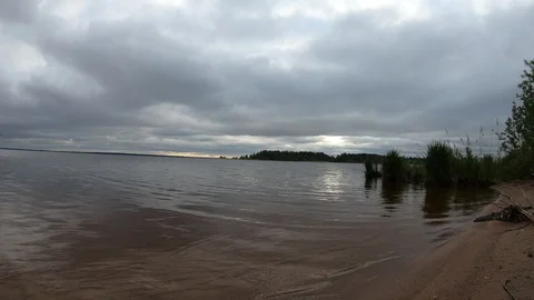 Timelapse clouds over the river. Cloudy weather on the lake Stock Footage 108539416