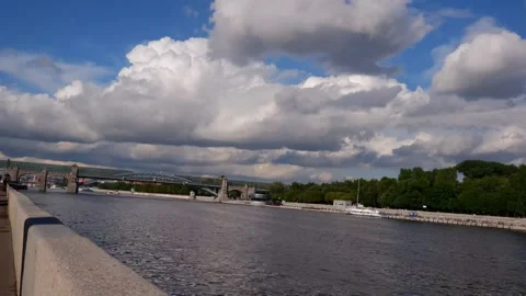 Timelapse. Clouds over the river overlooking the city. Stock Footage 156619894