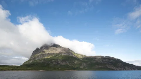 Timelapse of clouds over rocks Stock Footage 143536154