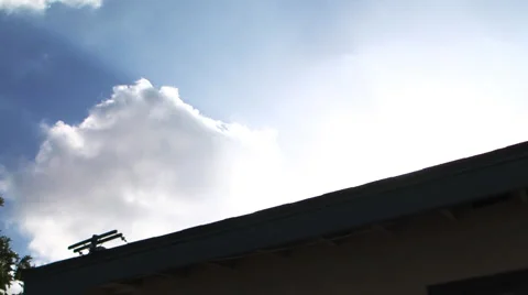 Timelapse clouds over roof Stock-Footage 3014854