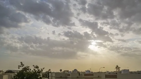Timelapse of clouds over rooftop Stock Footage 79301602