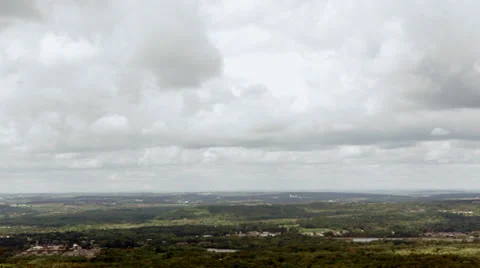 Timelapse: Clouds over a small town valley Stock Footage 31649399