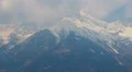 Timelapse of clouds over snowy mountain peaks, Austrian Alps HD Footage