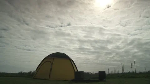 Timelapse clouds over tent Stock Footage 10796546