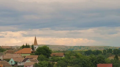 Timelapse Clouds Over the Town + Church Video stock 79709103