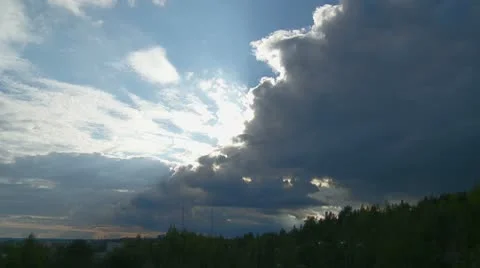 Timelapse of clouds passing by after rain Stock Footage