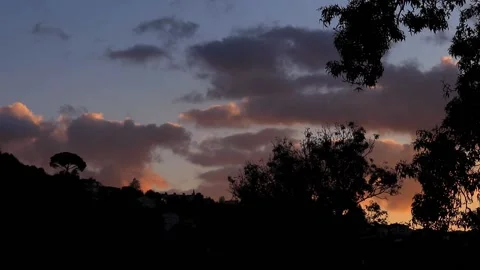 Timelapse Of Clouds Passing By. Dark Sunset Scene Stock Footage 167382599