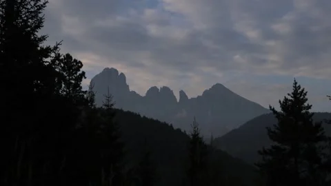 Timelapse of clouds passing in the mountains of the dolomites Stock Footage 244264515