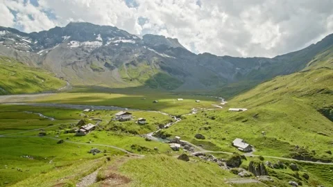 Timelapse of clouds passing mountains. View on Engstligenalp in Adelboden. Ca Video stock 144449107