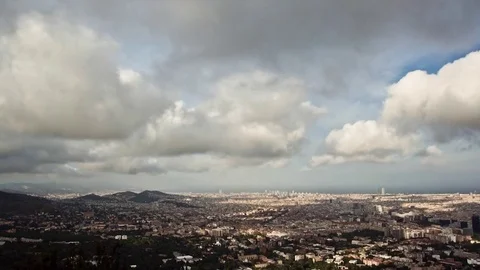 Timelapse of clouds passing over the city of Barcelona, as seen from Collserola. Stock Footage 69968083