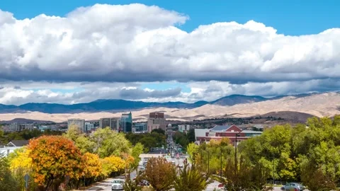 Timelapse of clouds passing over Downtown Boise, traffic passing during Autumn Stock Footage 163474960