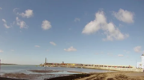 Timelapse of Clouds Passing Over a Harbour Stock Footage 56151691